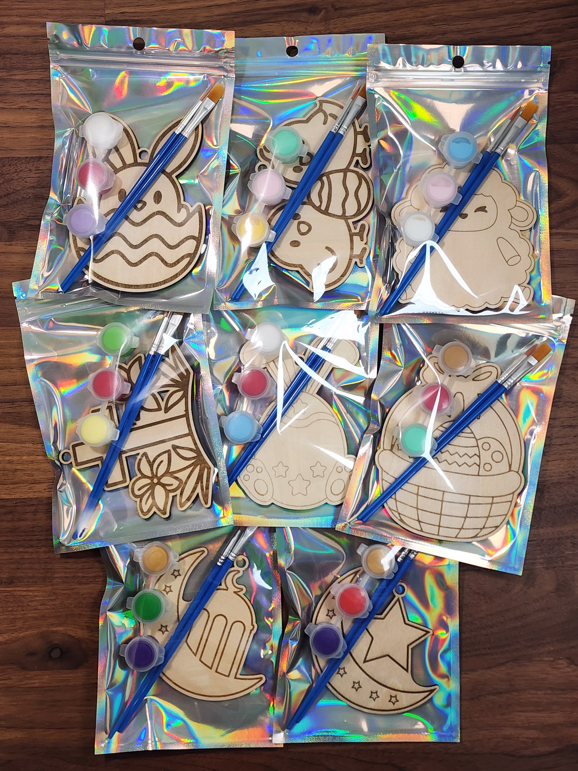 Paint kits in holographic bags with an easter/spring theme